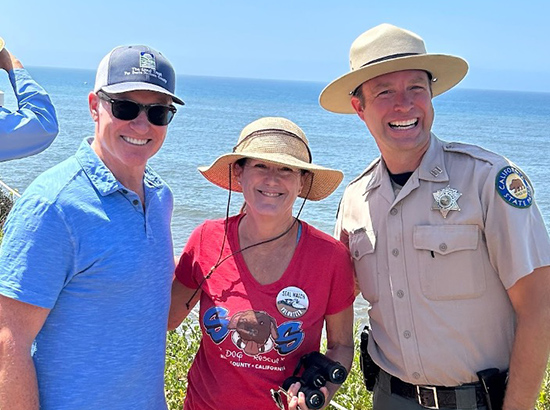 Asm. Hart with constituent and park ranger, with ocean in background