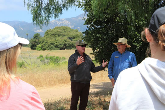 Asm. Hart speaking with constituents on hike