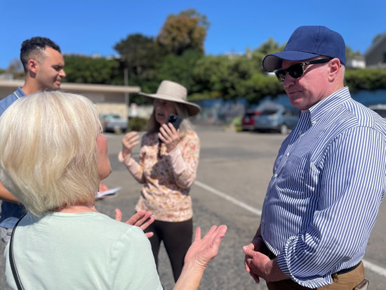 Asm. Hart speaking with constituents