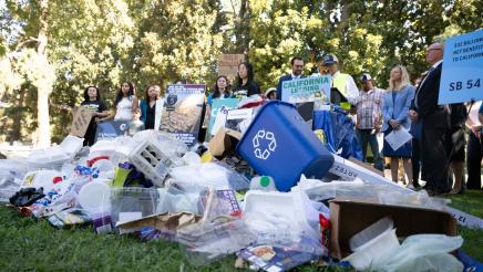 Recyclables piled in foreground